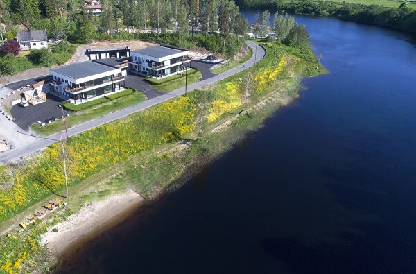 Bolig med sol, egen strand og promenade